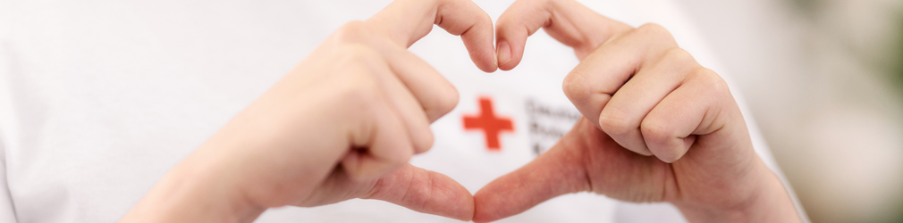 Hände die ein Herz formen